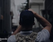 Man taking a photograph of a city